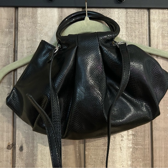 Aqua Handbags - Aqua crossbody handle bag in embossed black.